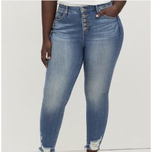 Torrid bombshell skinny blue light wash jeans, distressed cuffs, high rise plus
